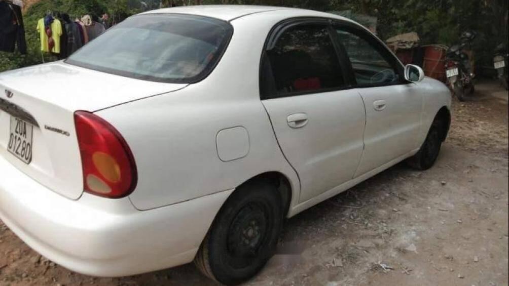 Cần bán lại xe Daewoo Lanos sản xuất 2003 màu trắng nhập khẩu