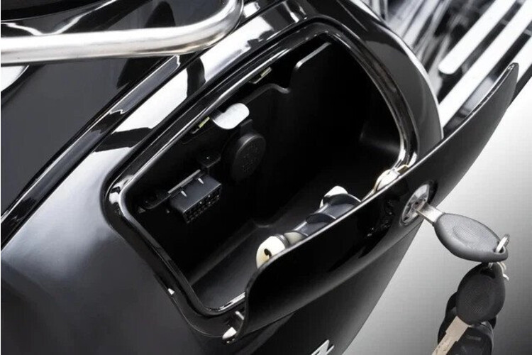 Nhìn như Vespa hay Lambretta thì che đậy, nhưng đây là tài xế của tôi mỗi khi đi làm.