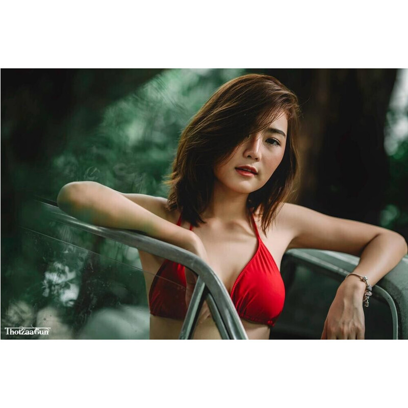 https://cdn.dailyxe.com.vn/image/sung-so-truoc-nguoi-dep-thai-lan-mac-bikini-do-mo-mong-trong-khu-vuon-7-59440j2.jpg